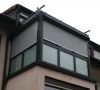 Wärmegedämmter Aluminium Wintergarten mit Dachmarkise mit Wind und Regensensor, Vorbaurollos zum Abdunkeln, wärmegedämmter 2 fach Verglasung und Ambientebeleuchtung